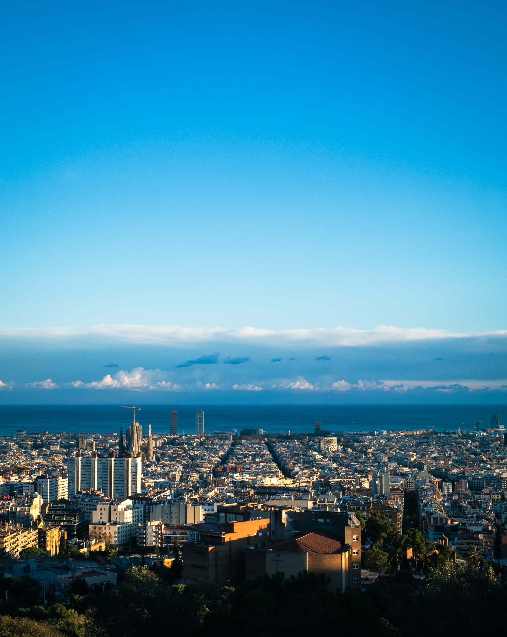 Sky, clouds, and a city at the bottom